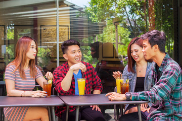College students drinking in restaurant together