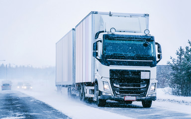 Plakat Truck in the Snowy winter Road in Finland of Lapland reflex