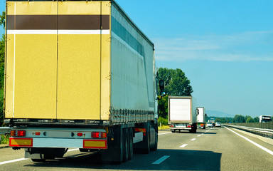 Trucks at road in Switzerland reflex