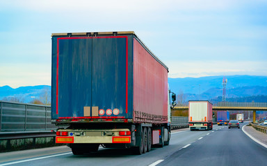 Trucks in road Trucker in highway Lorry doing logistics work reflex