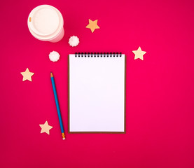 White notepad sheet on pink red background template