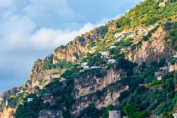 Obraz premium Typical narrow street and colorful houses in city of Positano, Amalfi coast