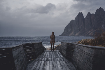 Women standing at the Tungeneset picnic on Senja - viewpoint and picnic area with its Nordic design structure nestled between the Steinfjord and the Ersfjord.
