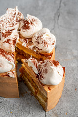 Delicious Tiramisu cake close-up on a Grey background. Top view.