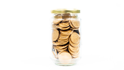 Jar full of golden coins on white background