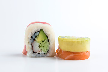 Isolated rainbow sushi roll white background