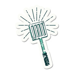 grunge sticker of tattoo style kitchen spatula