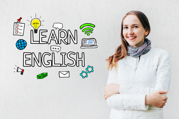 Learn english concept - girl on a white background with text and icons.