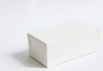Closed white box on white background
