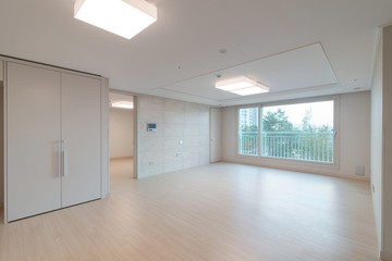 Interior of an empty living room in a new apartment.  
New apartment interior in South Korea.