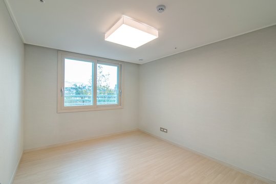 Interior of an empty small bedroom in a new apartment.  New apartment interior in South Korea.