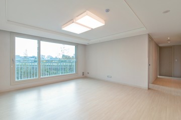 Interior of an empty living room in a new apartment.  
New apartment interior in South Korea.
