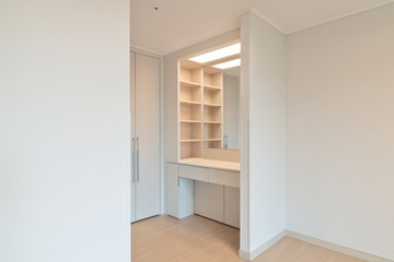 Interior of a dressing table space in a new apartment. New apartment interior in South Korea. Built in dressing table.