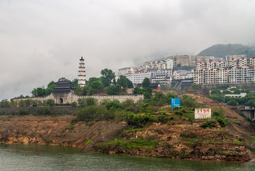 Baidicheng, China - May 7, 2010: Qutang Gorge on Yangtze River. Landscape with Gate and pagoda to...