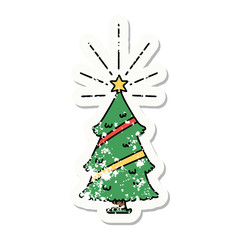 grunge sticker of tattoo style christmas tree with star