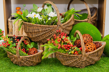 Fototapeta na wymiar A basket full of colorful flowers