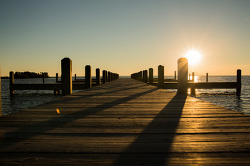 Sunrise at the Pier with Pylon Shadows at Corolla, North Carolina 