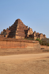 The Ancient Dhammayangyi temple at sunset in the old Bagan, Myanmar, Burma.