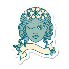 tattoo sticker with banner of a maidens face winking