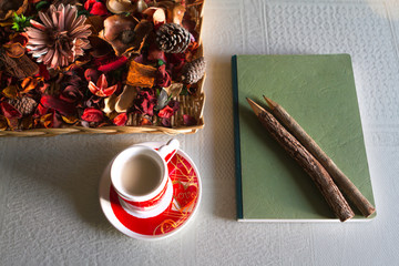 love cup of coffe. Green note book and flower