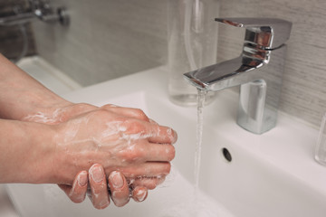 Washing hands rubbing with soap woman for corona virus prevention, hygiene to stop spreading coronavirus.sanitiser, covid 19