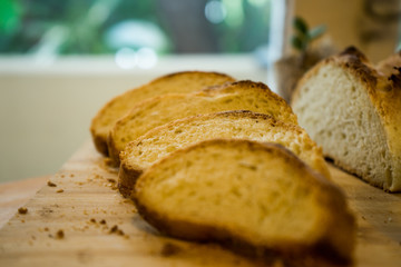 simple table with breads in the foreground