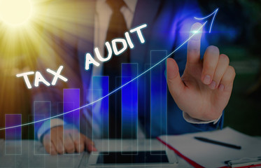 Conceptual hand writing showing Tax Audit. Concept meaning examination or verification of a...