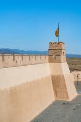 The majestic Jiayuguan City watchtower in Gansu Province, China. Chinese characters on black plaque: Jiayuguan.The majestic Jiayuguan Great Wall Corner Tower in Gansu , China.The turret of the wall © Liu Lei