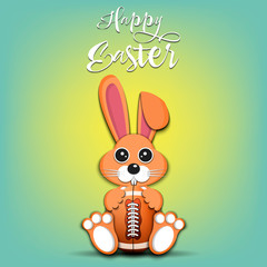 Rabbit with easter egg decorated in the form of a football ball