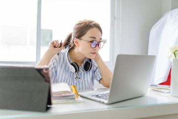 Working from home,Self isolation, Online learning concept.Woman freelancer lecture and working on laptop at home.Self isolation from Coronavirus Covid-19 crisis.Lock down Stay at home for quarantine.