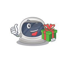Fototapeta premium Smiling astronaut helmet cartoon character having a green gift box