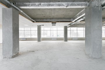 empty pure commercial office building undecorated in gray colors.open space office