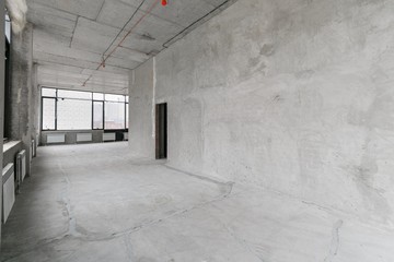 empty pure commercial office building undecorated in gray colors.open space office