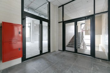 empty pure commercial office building undecorated in gray colors.open space office