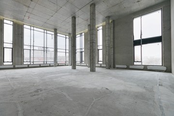 empty pure commercial office building undecorated in gray colors.open space office
