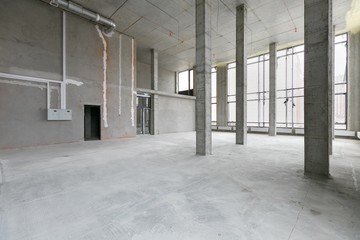 empty pure commercial office building undecorated in gray colors.open space office