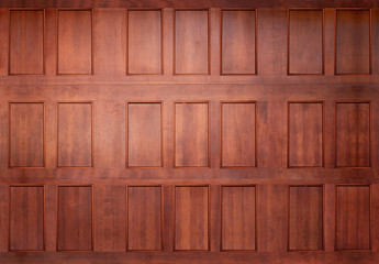 sealed deep brown stained wood garage car door