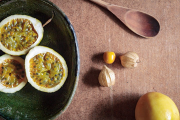 Passion fruit still life on a wooden background. Healthy, organic food concept