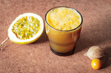 Passion fruit still life on a wooden background. Healthy, organic food concept