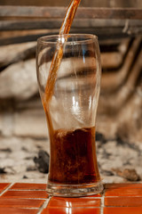 filling a glass of soda