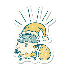 grunge sticker of tattoo style santa claus christmas character with sack