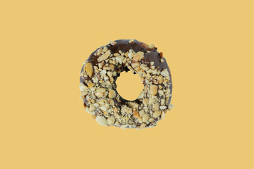 A donut on a yellow background