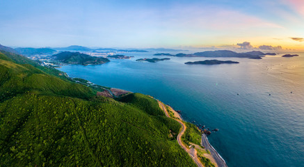 Fototapeta premium Aerial view of DT6571 road from Nha Trang city to Cam Ranh town, Khanh Hoa, Vietnam.
