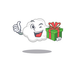 Smiling white cloud cartoon character having a green gift box