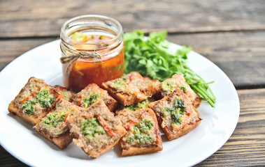 Fried toasts with Minced Pork Spread with chili sauce (Thai Pork Toast) . Toasts Menu for children.