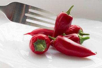  red pepper on a fork