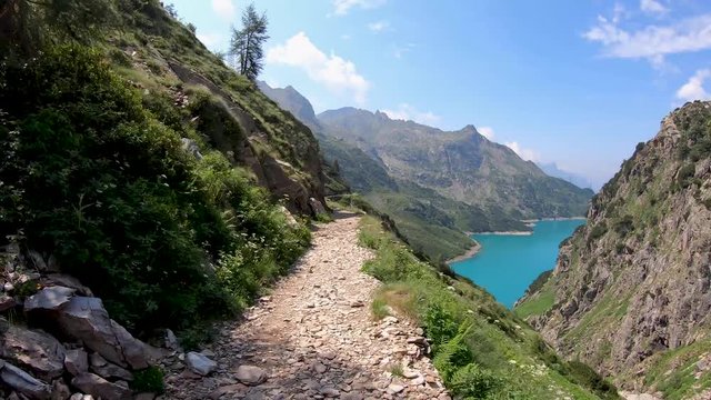Valbondione, Bergamo, Italy. Hyper lapse hiking on the trail between the Lodge Barbellino and Curo&rsquo;. Italian Alps, Orobie. Summer time