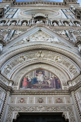 The marvellous art statue and painting decorated surrounding on Florance duomo, The mistery sculpture on Famous white Architectural cathedral church under blue sky at Florance, The largest church in I