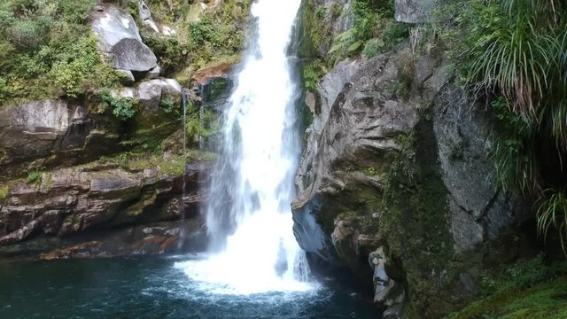 Wainui Falls waterfall in the Abel Tasman National Park at the top of the South Island of New Zealand. Filmed during winter