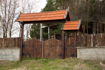 A wooden entrance gate to a rest area